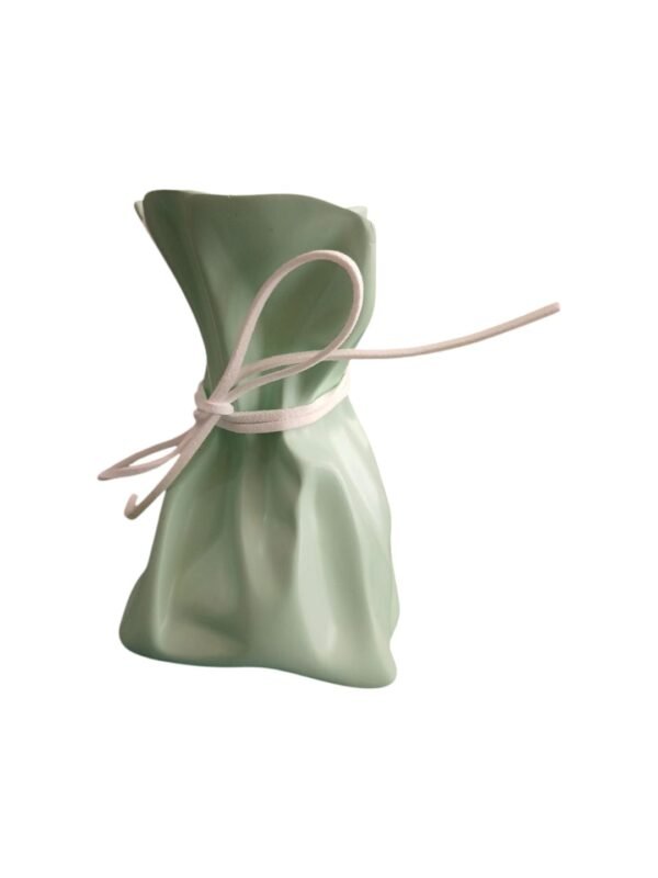 WhatsApp Image 2025-05-09 at 10.43.47_3f59cb74-Photoroom Crinkle Paper Bag Ceramic Vase Mold